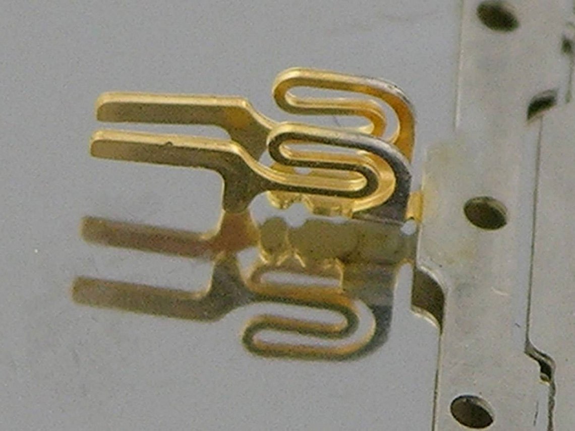 Switch contact folded and plated ready for assembly by soldering onto PCB